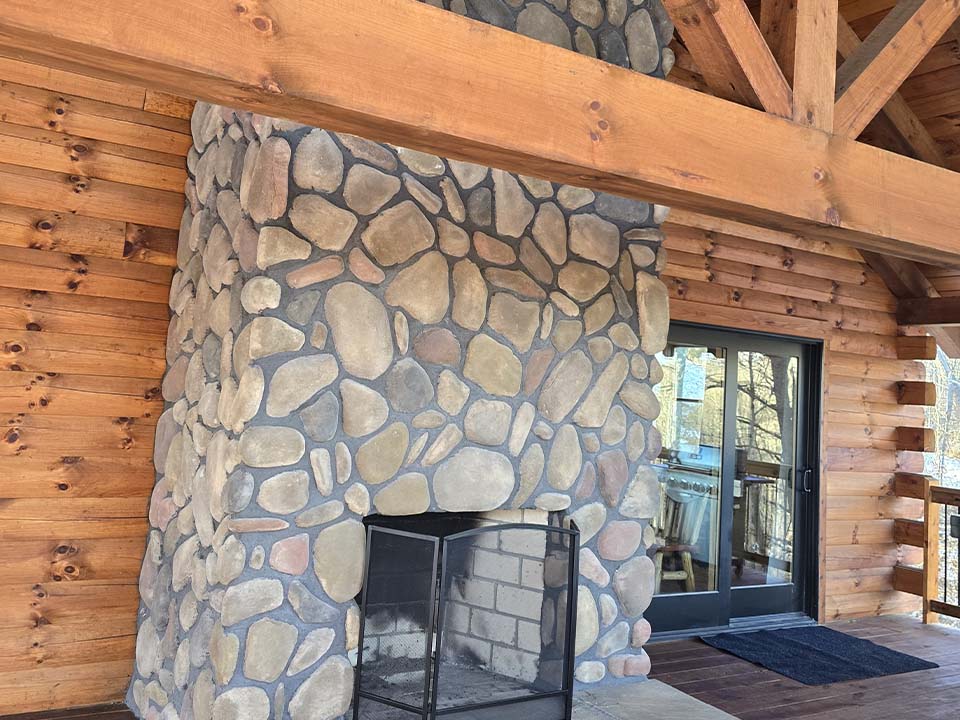 WILDLIFE ESCAPES CABIN Indoor fireplace living area at Hocking Hills Ohio cabin