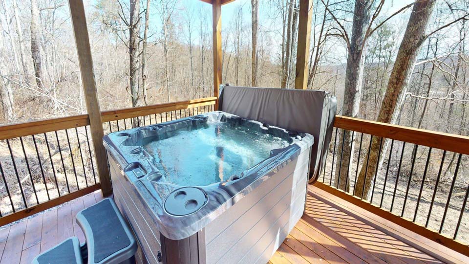 willifeesp-mar26-26 Warm living room featuring a cozy indoor fireplace and plush seating.